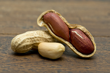 peanuts on wooden table