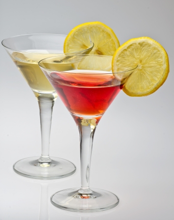 vermouth rosso   and white isolated on a white backgroundの写真素材