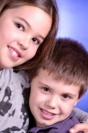 portrait of two children huggingの写真素材