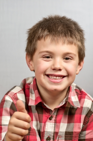 child making ugly faces  の写真素材