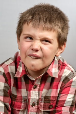 child making ugly faces  
の写真素材