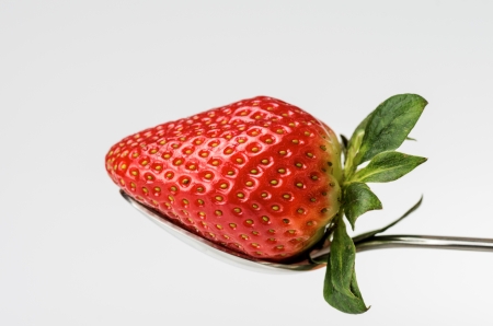 macro picture of fresh Strawberry with chocolate on white backgroundの写真素材
