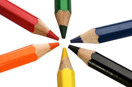 macro photography of colored pencils on white background