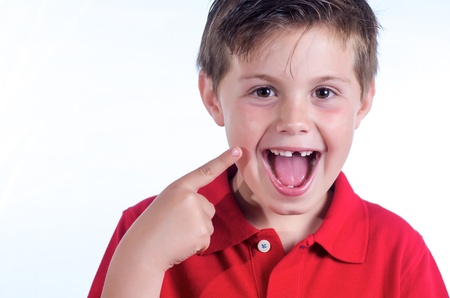 photographic portrait of a child who has lost a tooth