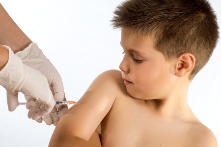 a doctor vaccinating a childの写真素材