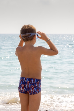 picture of a child playing on the beachの写真素材