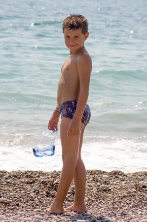 picture of a child playing on the beachの写真素材