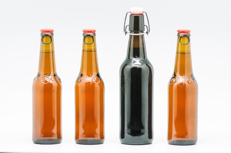 macro photograph of bottles of beer on white backgroundの写真素材