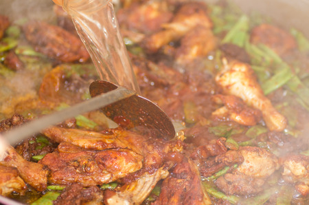 Preparation step of authentic Paella Valenciana Chicken, rabbit and vegetablesの写真素材