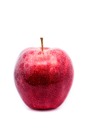 macro photography of a red apple on white backgroundの写真素材