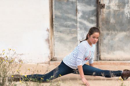 photographic portrait of a girl in a relaxed positionの写真素材