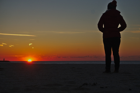 a person during sunsetの写真素材