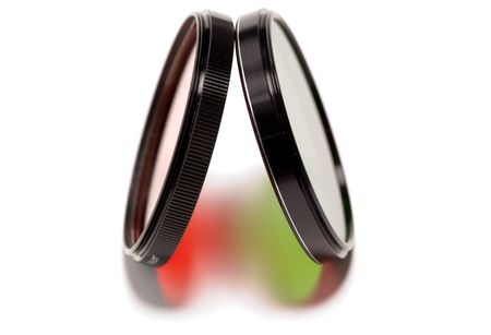 red and green photographic filters projecting colorful lightの写真素材