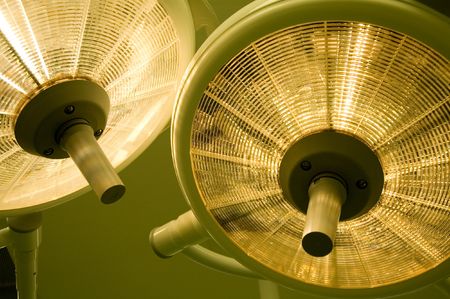 a set of two surgical lamps with dim light, please check out my portfolio for more!の写真素材