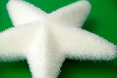 white christmas star against a green backgroundの写真素材