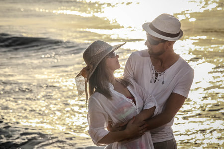 Couple of lovers on the beach doing wedding rehearsal.の写真素材