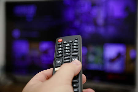 TV remote control in the living room turning on watch movies and series.