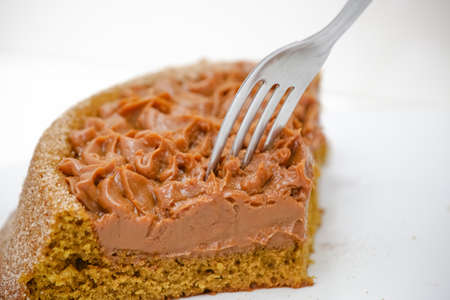 piece of delicious churros cake on the table ready to serve.