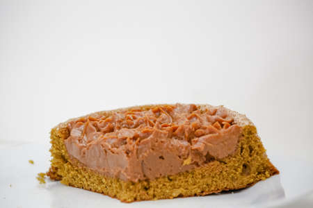 piece of delicious churros cake on the table ready to serve.