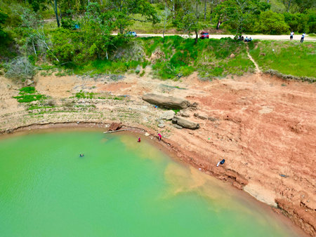 Aerial view of people walking on the sand beach at Khao Sok National Park, Thailandのeditorial素材