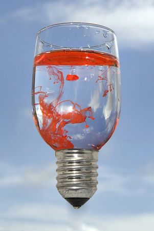lamp Glass with red drops against the blue skyの写真素材