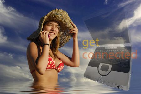 Beautiful girl on the phone with reflectionの写真素材