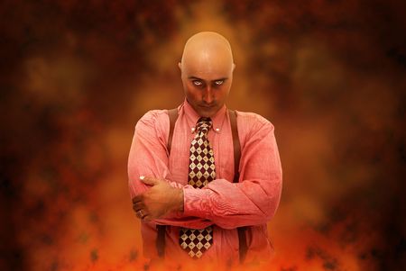 Devilish businessman in hellの写真素材