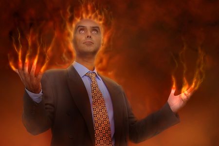 Devilish businessman in hellの写真素材