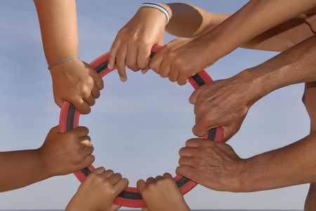 Several hands holding a circleの写真素材