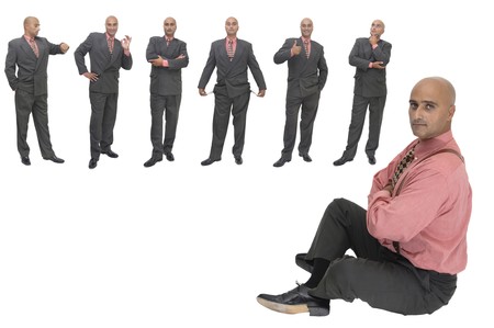 Businesman in several positions isolated against a white backgroundの写真素材