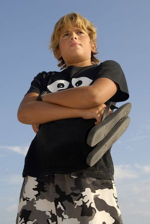 Boy posing in the beach
