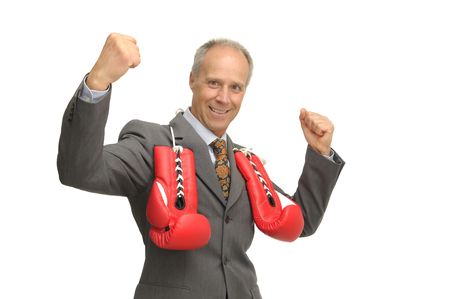 Businessman with boxing gloves isolated against a white backgroundの写真素材