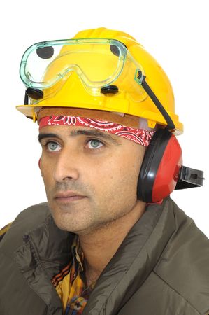 Worker with hat and protection phones isolated in whiteの写真素材