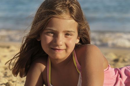 Young girl posing in the beachの写真素材