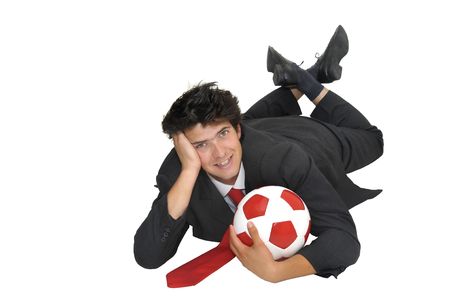 Businessman with a soccer ball  isolated in whiteの写真素材