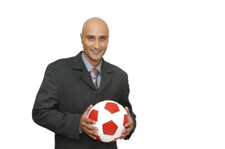 Businessman with a soccer ball  isolated in whiteの写真素材