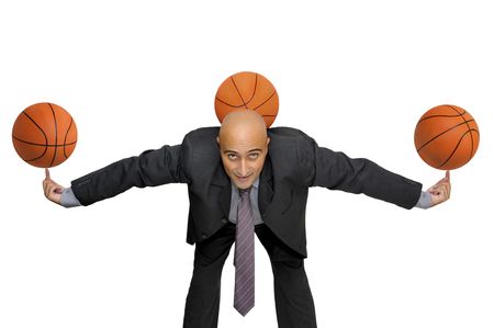 Businessman with several basketballs isolated in whiteの写真素材
