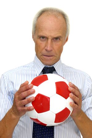 Businessman with a soccer ball  isolated in whiteの写真素材
