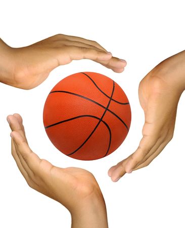 Hands around a basket ball isolated in whiteの写真素材