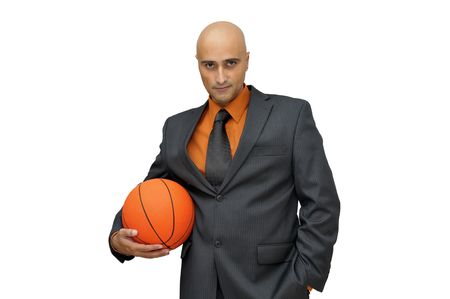 Businessman with basket ball isolated in whiteの写真素材