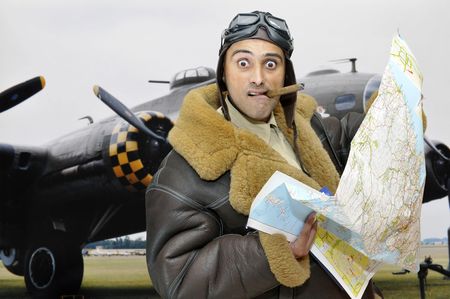 WWII figther pilot with map and funny faceの写真素材