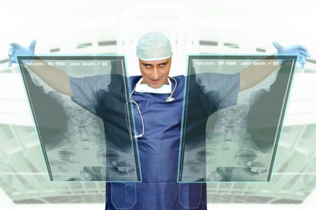 Doctor with hightech computer screen viewing patient data