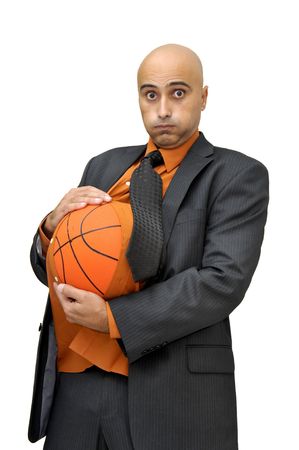 Businessman with basket ball isolated in whiteの写真素材