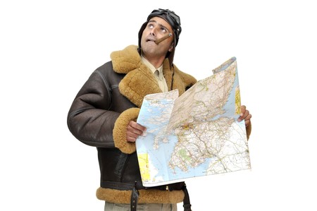 WWII fighter pilot with map isolated in whiteの写真素材