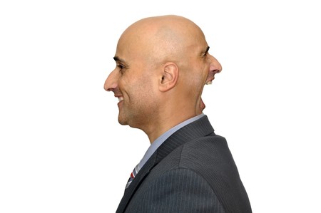 Businessman with several expressions isolated in whiteの写真素材