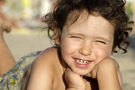 Little boy posing in the beachの写真素材