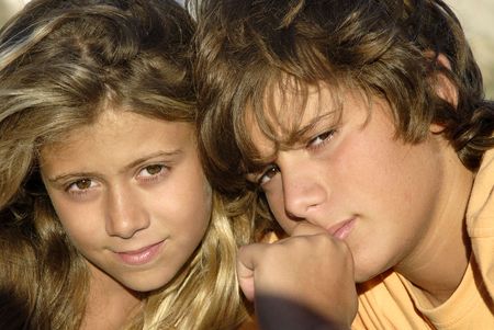 Young couple posing in the beachの写真素材