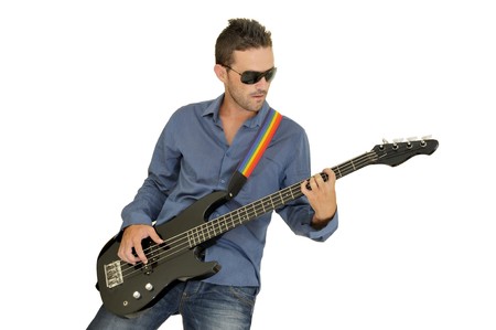 Young man playing guitar isolated in white