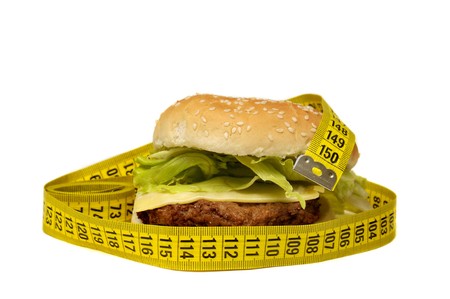 Hamburger with measuring tape isolated in a white backgroundの写真素材