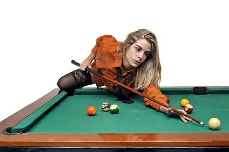 Sexy girl with man's shirt and tie playing snooker 